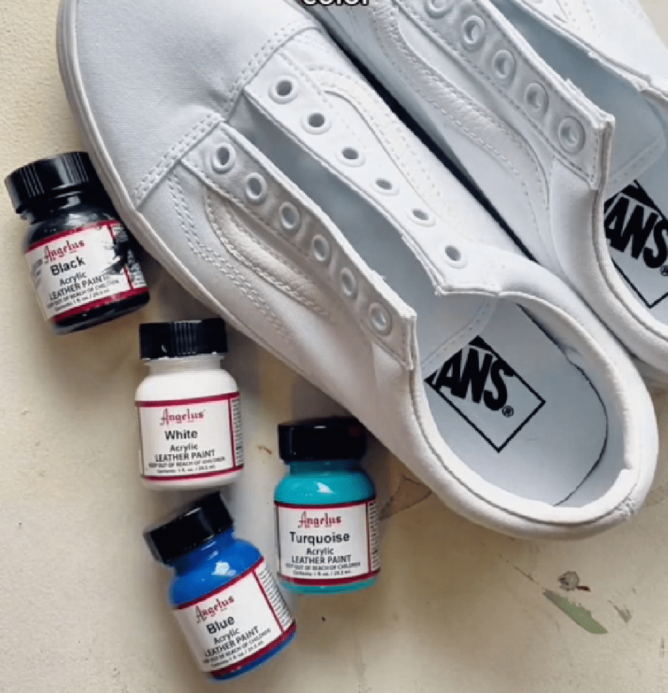 Flat lay of blank white Vans and Angelus acrylic paints in black, white, blue, and turquoise.