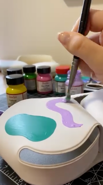painting a headphone case with Angelus Paints