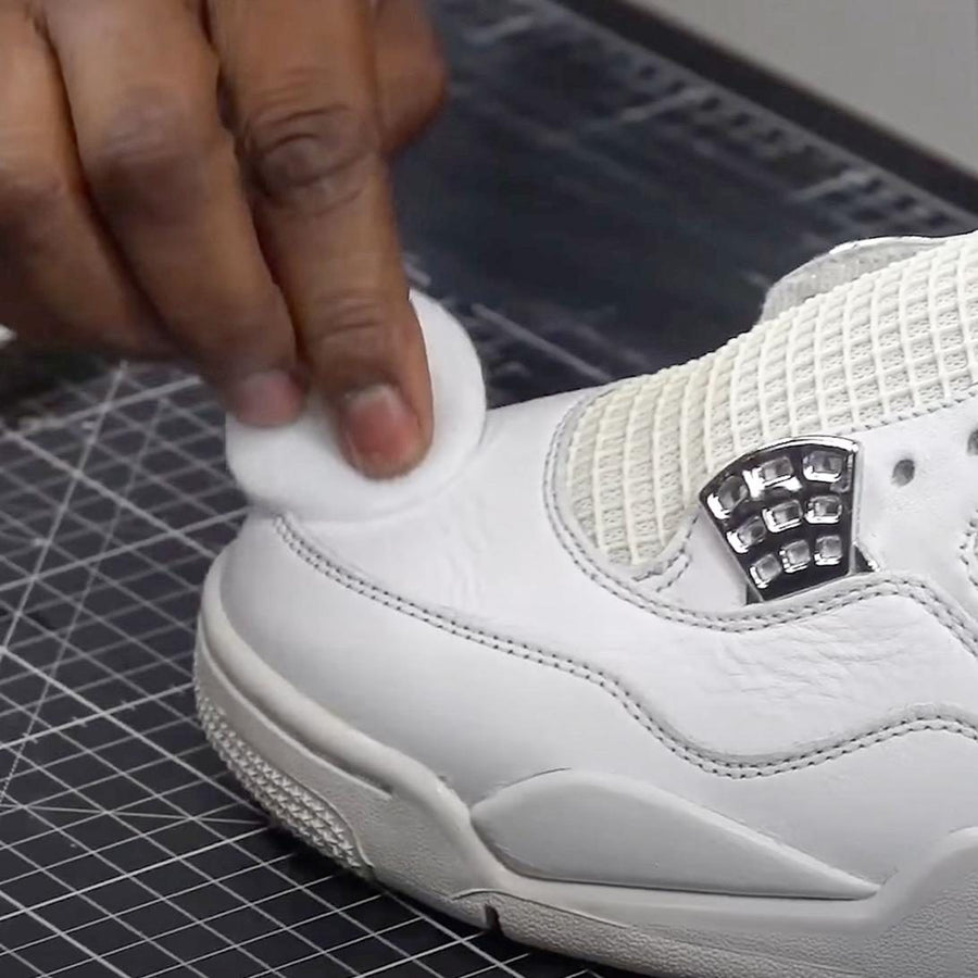 Removing paint and finish from a white leather sneaker with Angelus Leather Preparer and Deglazer