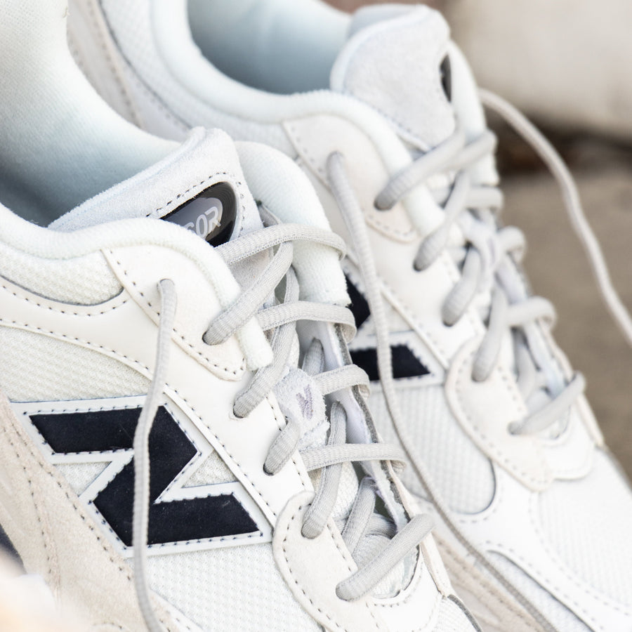 Close-up of Sydney Levrone x New Balance 9060R styled with Lace Lab Light Grey Thin Oval Laces