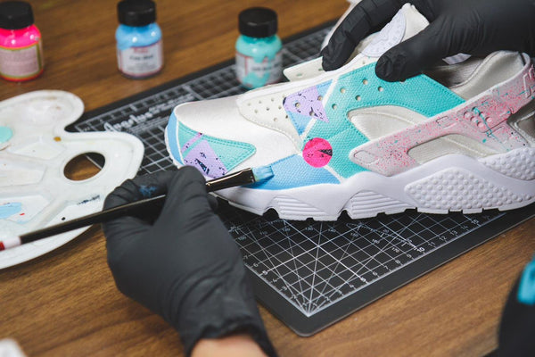Painting a pastel design on a leather sneaker with Angelus Paint and a fine brush