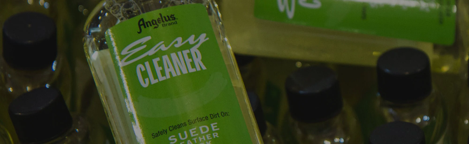 Angelus Easy Cleaner bottle close-up for leather bag cleaning.