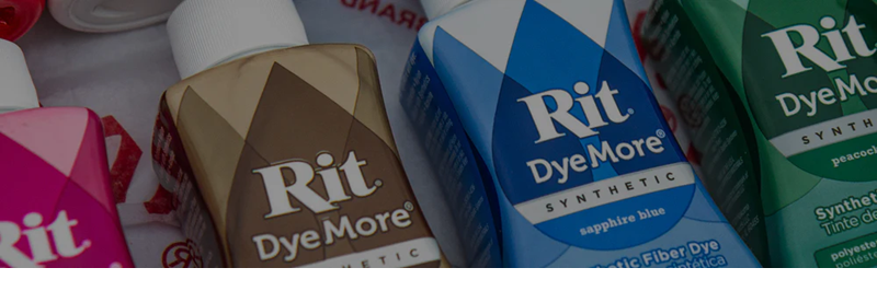 Bottles of Rit DyeMore polyester fabric dye in assorted colors.