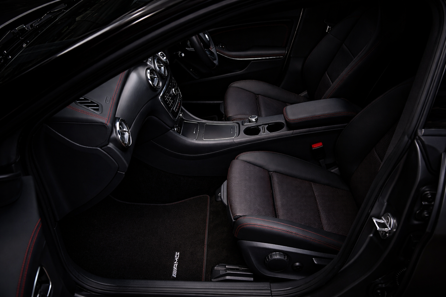 Close-up of leather car seats and center console