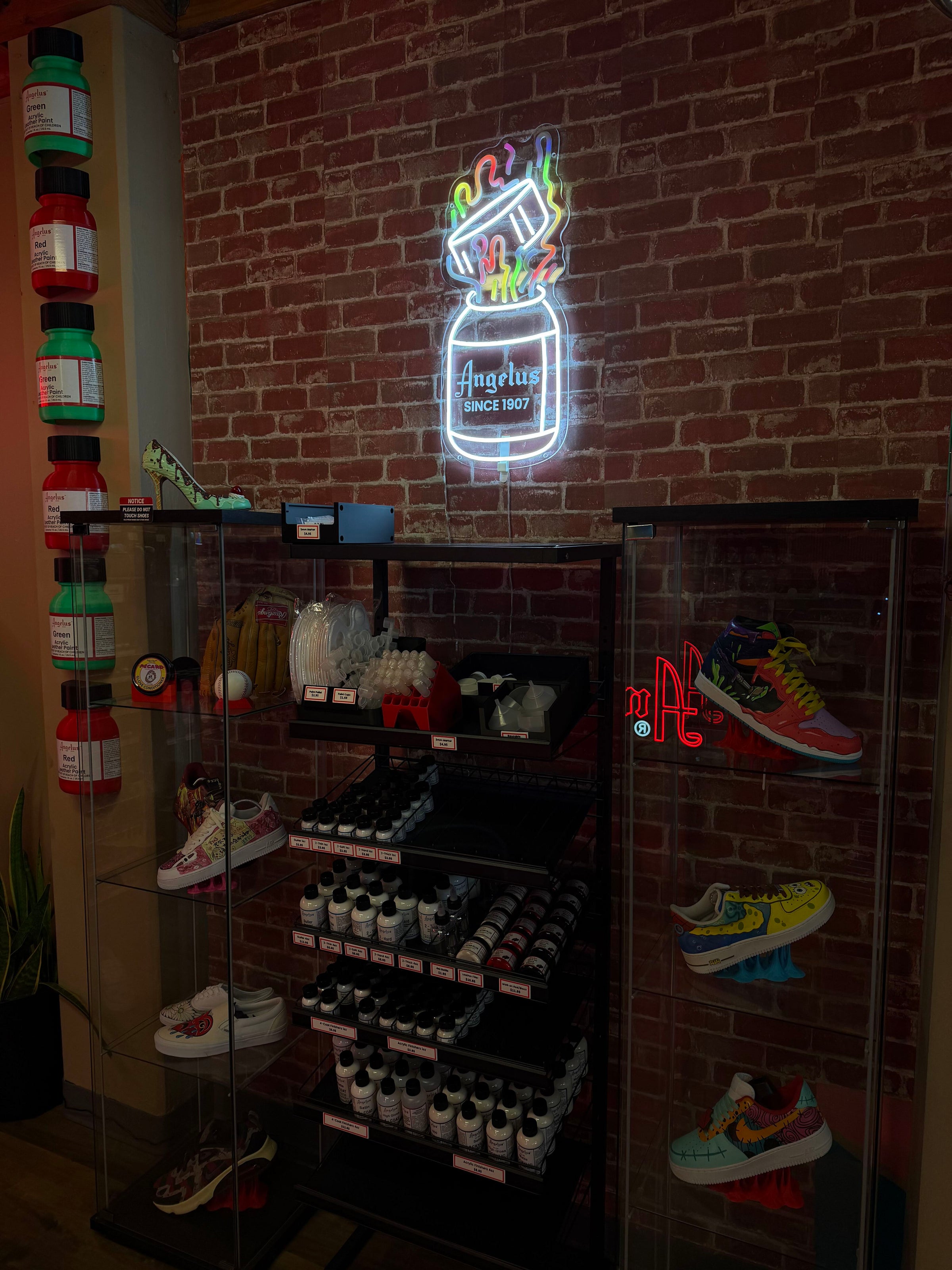 Angelus Bottle Changing Neon Sign in Store
