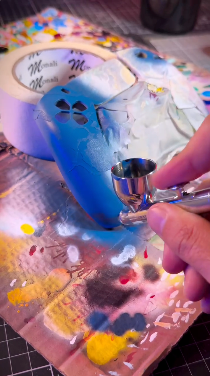 Airbrushing painting a game controller with Angelus Paints
