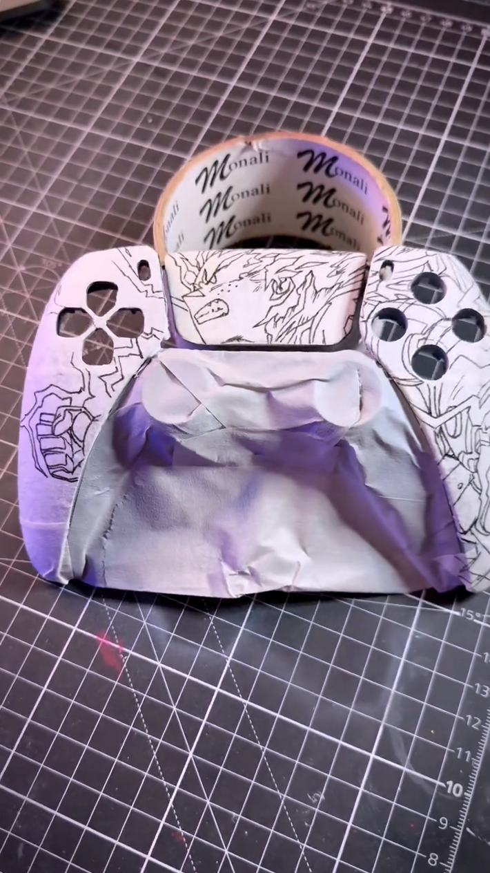 Painting a base coat on a video game controller